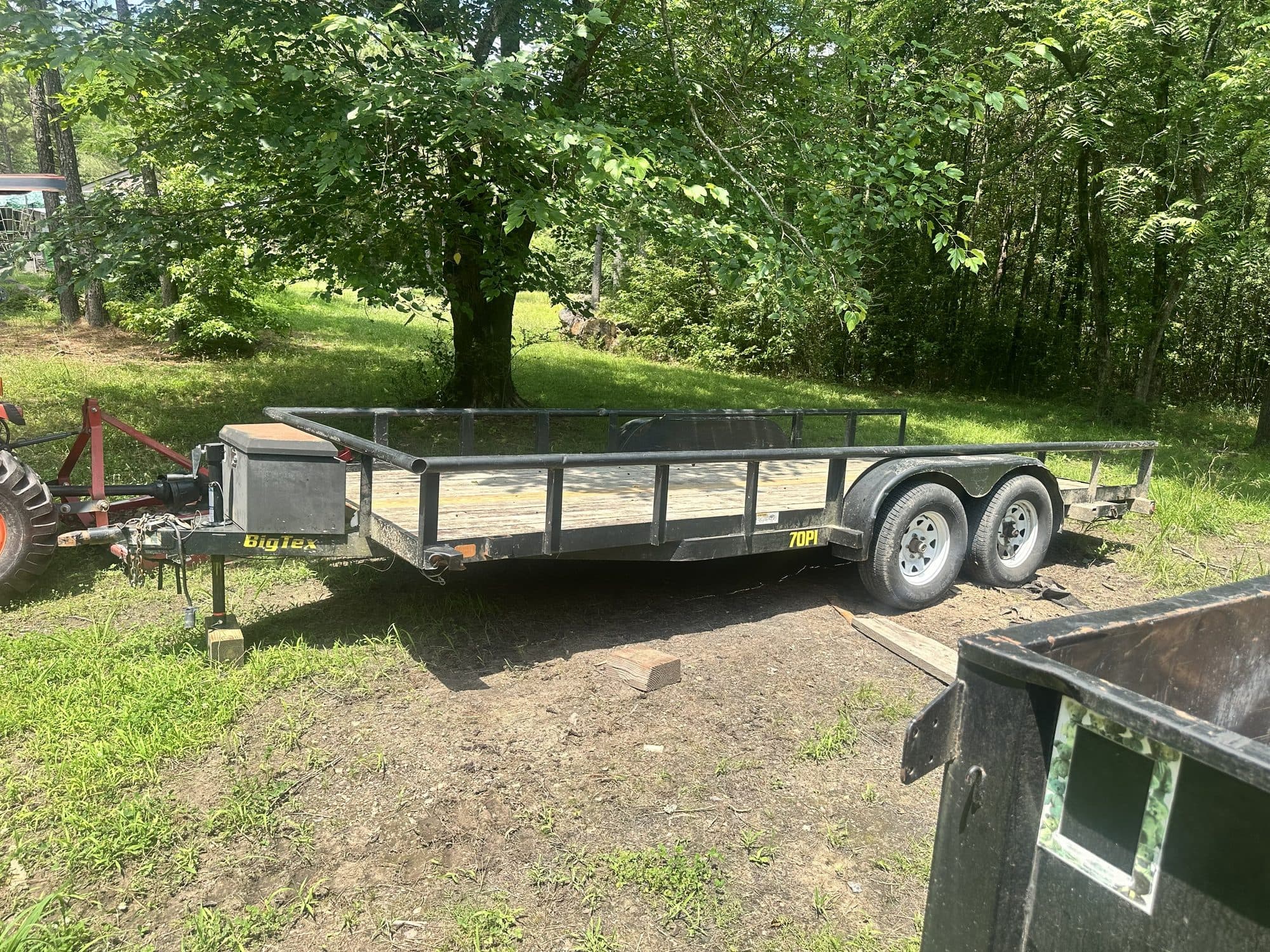 Flatbed trailer for Norman Arkansas cleanouts and hauling